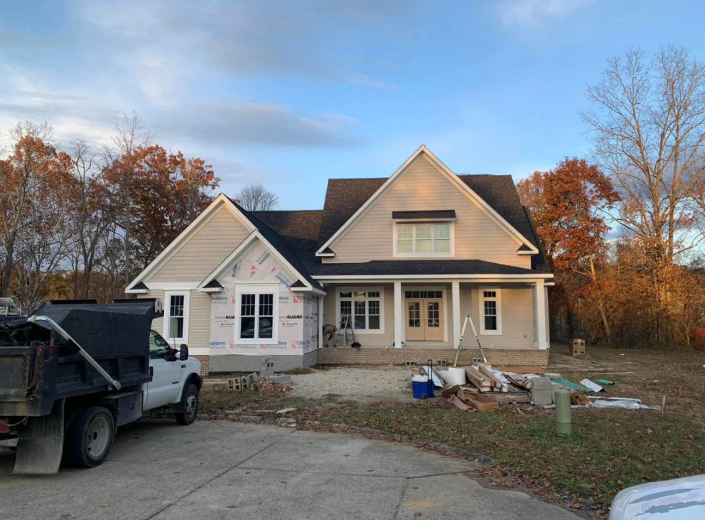 House with partially completed siding