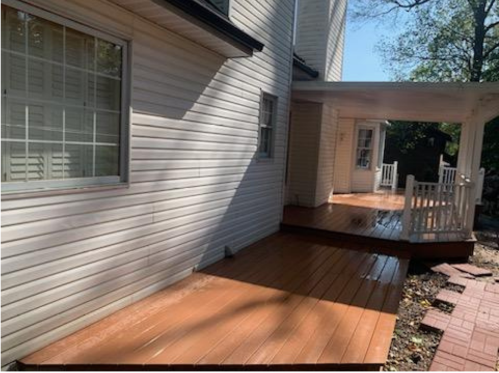 Brown composite deck with white banister