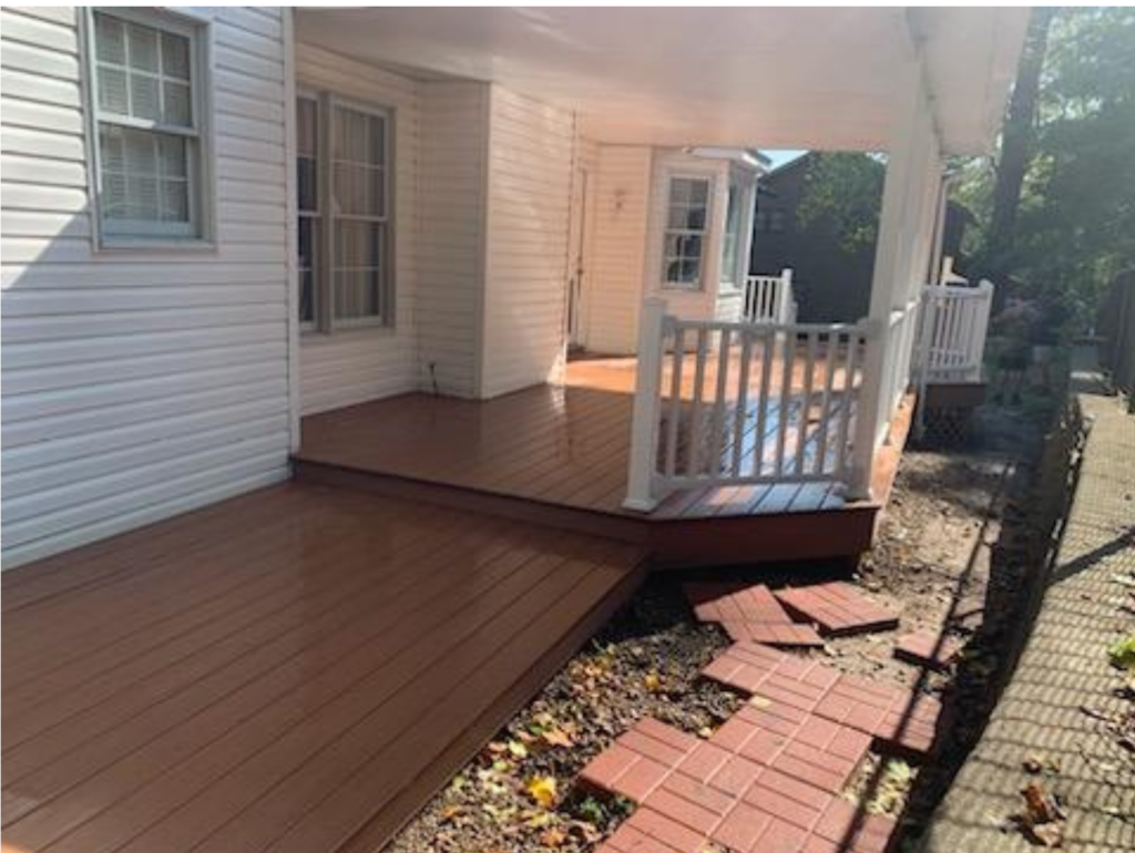 Brown composite deck with white banister