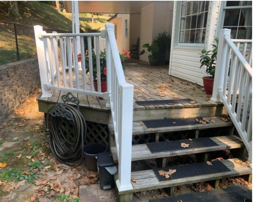 Wooden deck with white banister